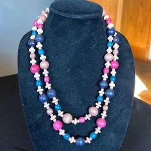 Layered bead necklace very cool  feels like wood